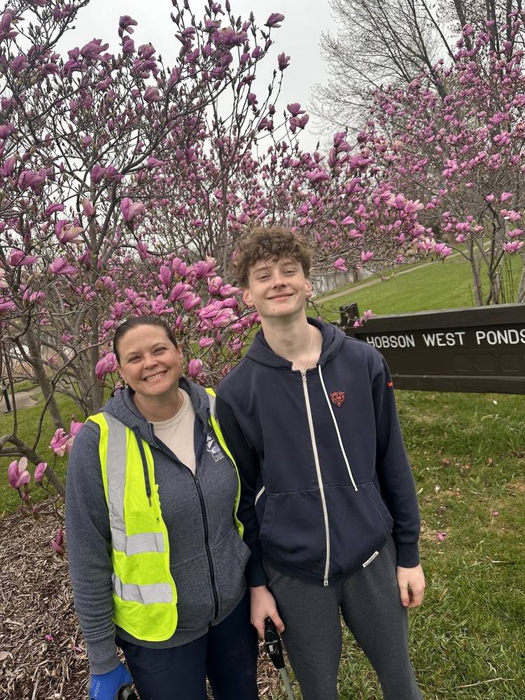 Amy Phillips with her son at Hobson West Ponds park during a spring cleanup